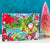 Pop-Up Mākeke - Surf Shack Puzzles - Santa's Tropical Xmas by Suzanne J. Puzzle - Front View