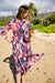 Pop-Up Mākeke - David Shepard Hawaii - Kaniakapūpū Lehua 'Ula Women's Midi Wrap Dress - Back View