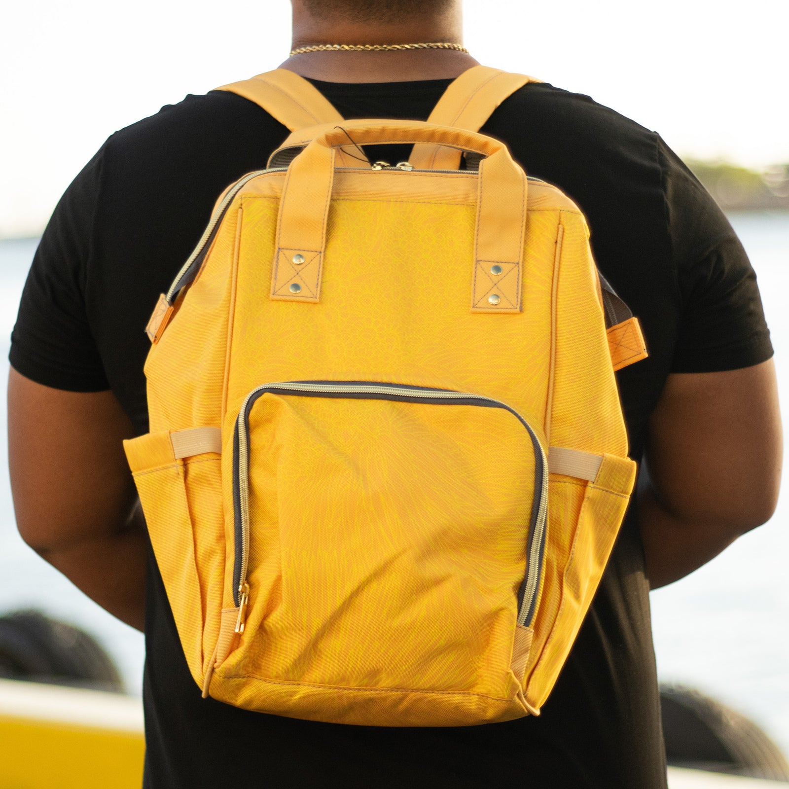 Pop-Up Mākeke - Kini Zamora - Silversword Waterproof Backpack - Yellow - Front View