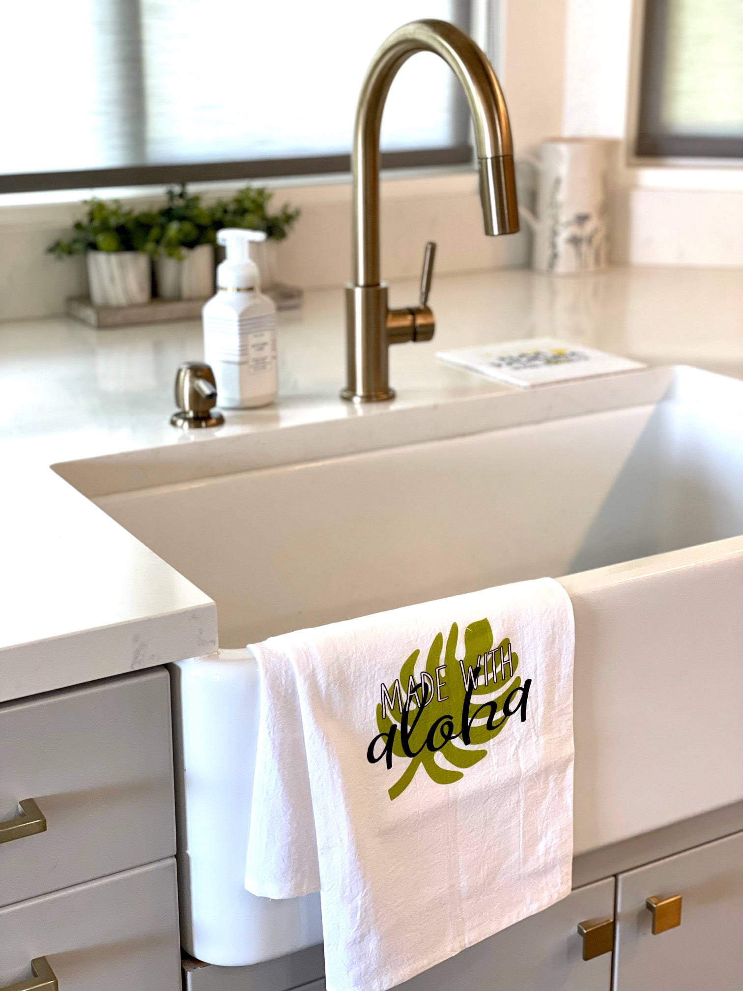 Pop-Up Mākeke - Sal Terrae - Flour Sack Kitchen Towel - Made with Aloha - Green Monstera - In Use