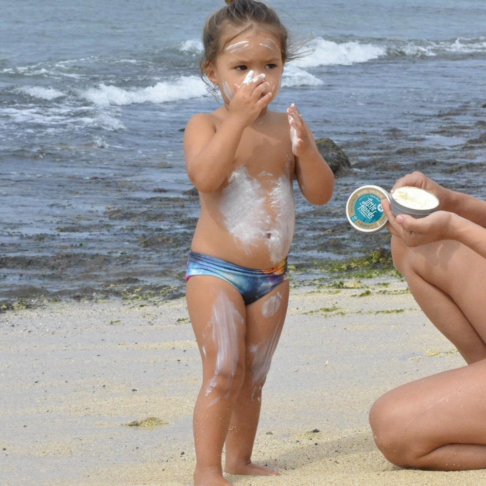 Pop-Up Mākeke - Little Hands Hawaii - Body & Face Mineral Sunscreen - In Use