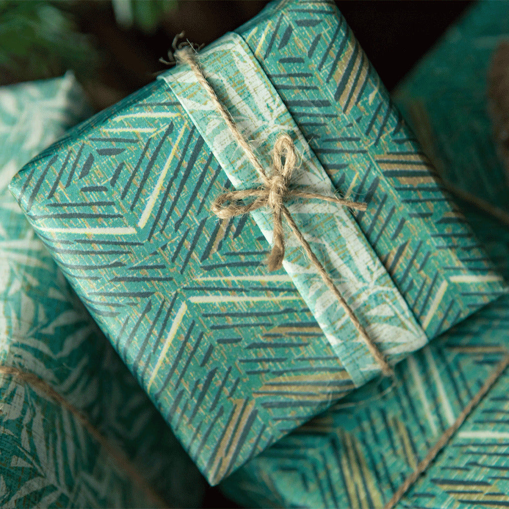 Pop-Up Mākeke - Noho Home - ʻAkahi & Lauaʻe Reversible Wrapping Paper - In Use
