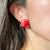 Pop-Up Mākeke - Ohana Expressions - Red Torch Ginger Stud Earrings - In Use
